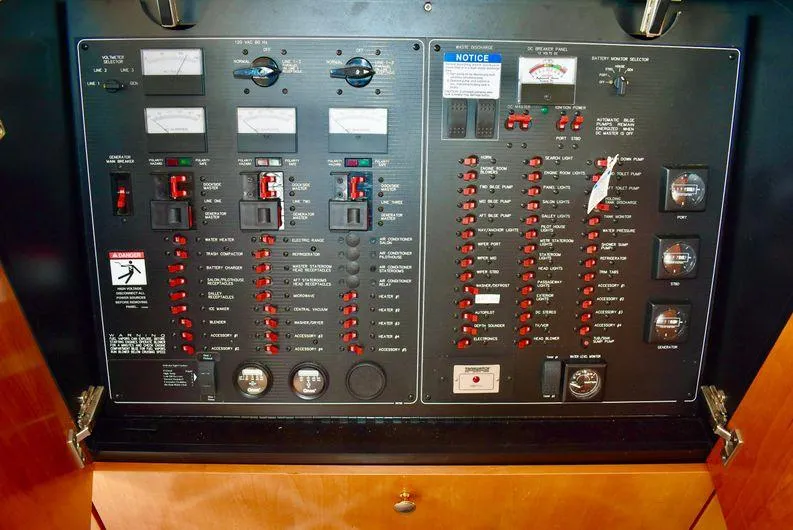 Slide: The Image of Electrical control panel of a 2004 Meridian 490 Pilothouse boat. - 17