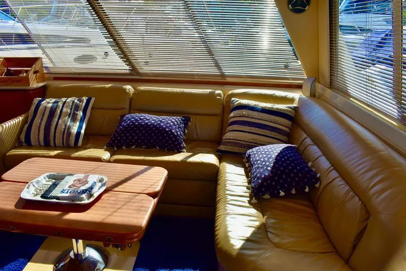 Slide: The Image of Luxurious interior of 2004 Meridian 490 Pilothouse with leather seating and decorative pillows. - 20