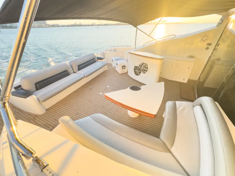 Slide: The Image of Luxurious 2006 Sunseeker Predator 82 yacht deck with elegant seating and ocean view. - 14