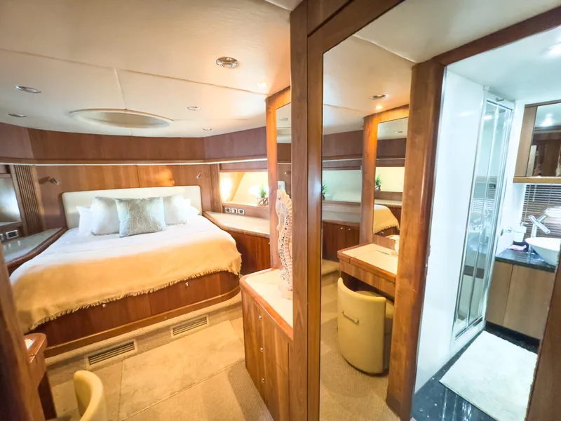 Slide: The Image of Luxurious bedroom interior of 2006 Sunseeker Predator 82 yacht with ensuite bathroom. - 16