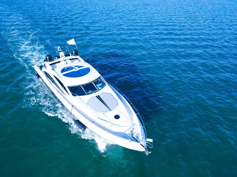 Slide: The Image of Sunseeker Predator 82 yacht cruising on open sea, 2006 model. - 2
