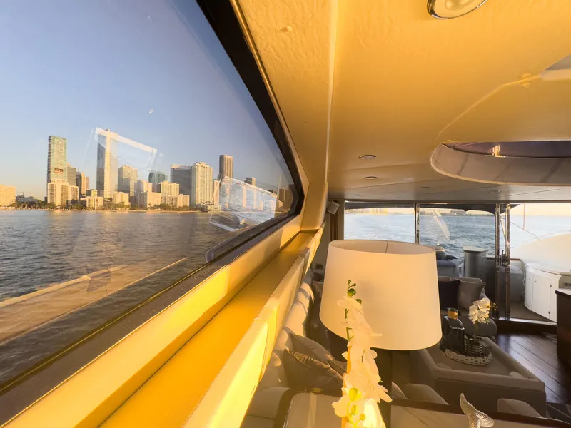 Slide: The Image of Interior view of 2006 Sunseeker Predator 82 yacht with city skyline reflection. - 8