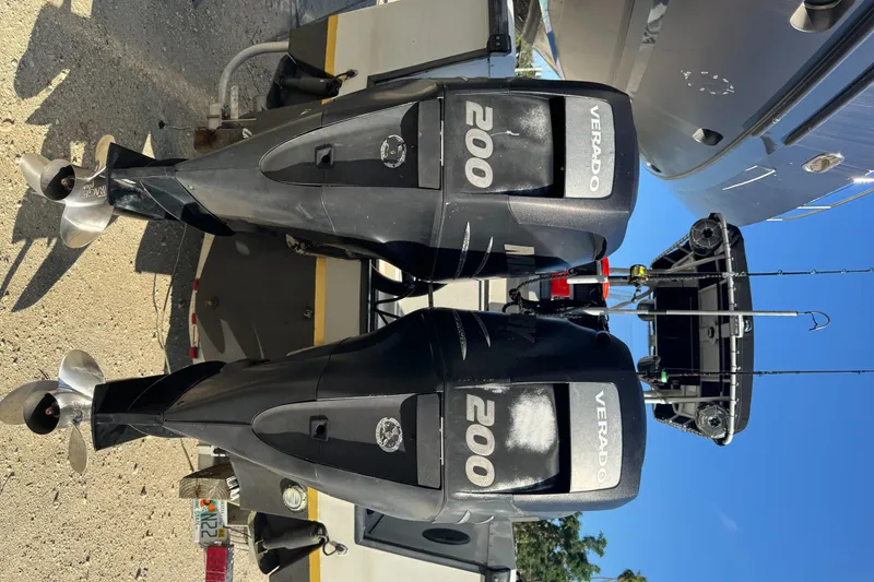 Slide: The Image of Twin Mercury Verado 200 engines on a 2005 Boston Whaler Justice 240 boat. - 5