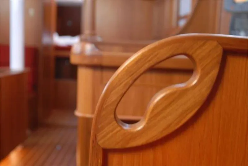 Slide: The Image of Interior of 2025 Rustler 42 yacht, featuring elegant wooden craftsmanship and design. - 17