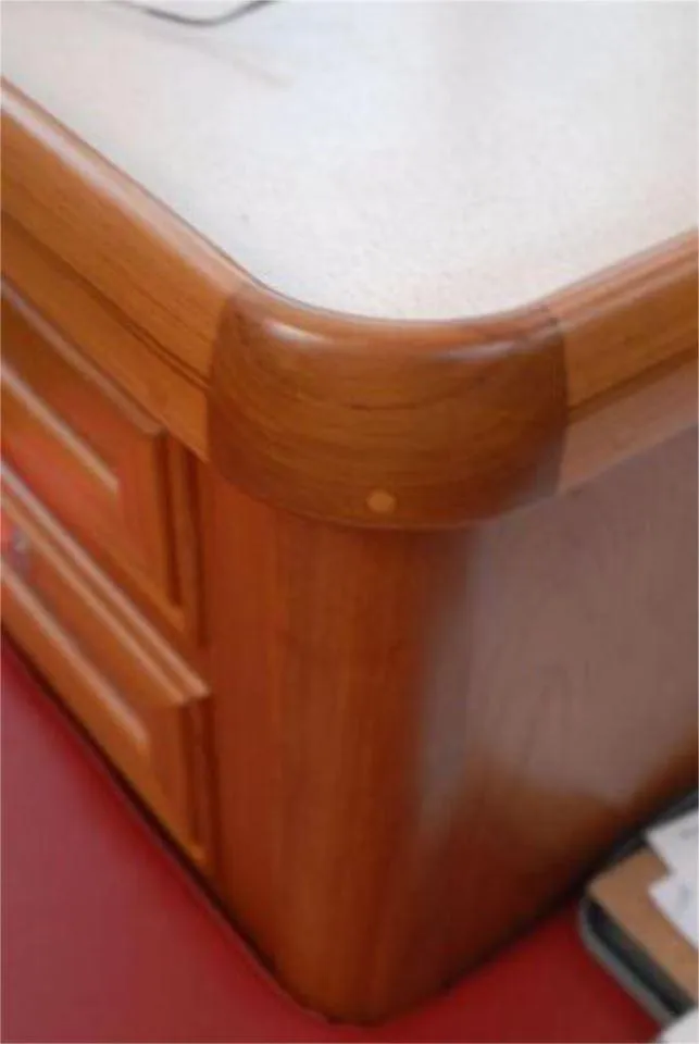 Slide: The Image of Wooden furniture corner with smooth finish, Rustler 42 model, 2025 design. - 23