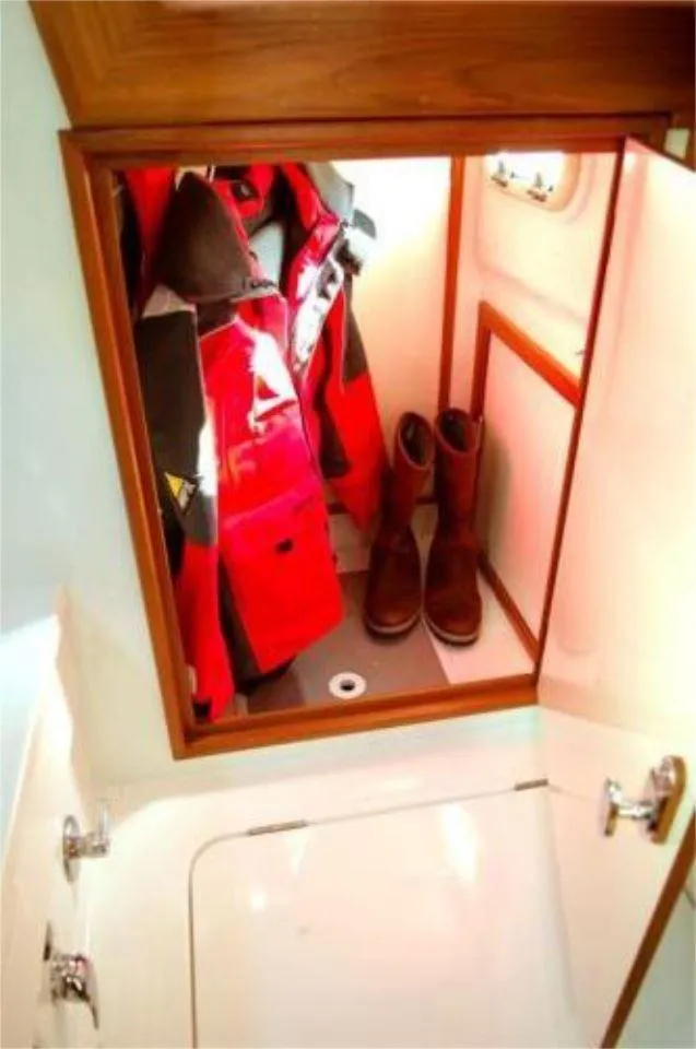 Slide: The Image of Cabin closet in 2025 Rustler 42 yacht with jackets and boots. - 24