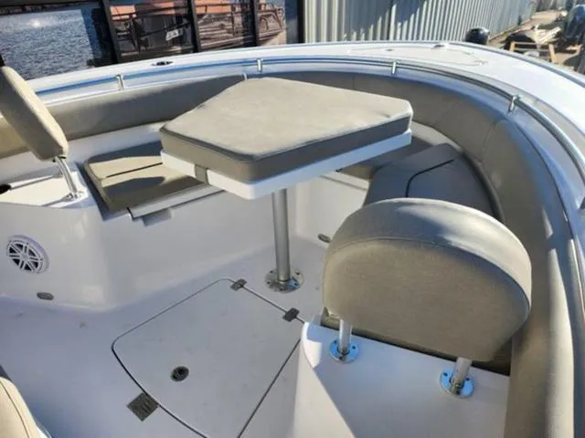 Slide: The Image of 2025 Sportsman Heritage 231 boat interior with toilet and wiring. - 18