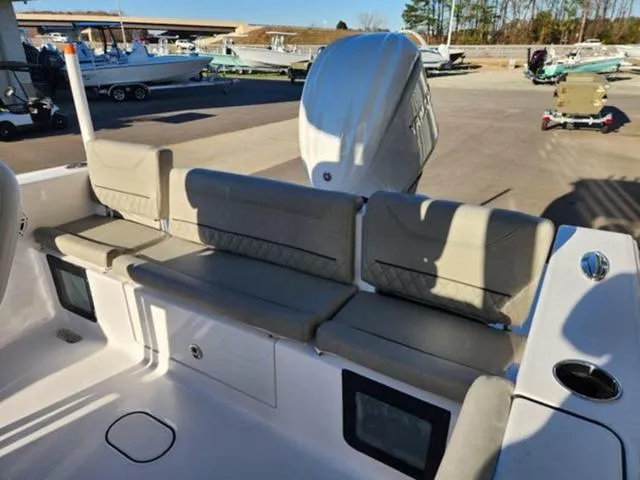 Slide: The Image of 2025 Sportsman Heritage 231 boat interior with seating and table. - 19