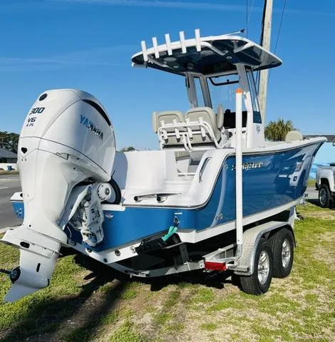 Slide: The Image of Interior view of 2025 Sportsman Heritage 231 boat, featuring modern controls and blue ceiling. - 5
