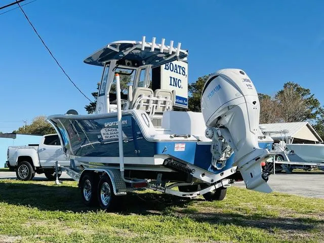 Slide: The Image of 2025 Sportsman Heritage 231 boat interior with cushioned seating and modern design. - 6