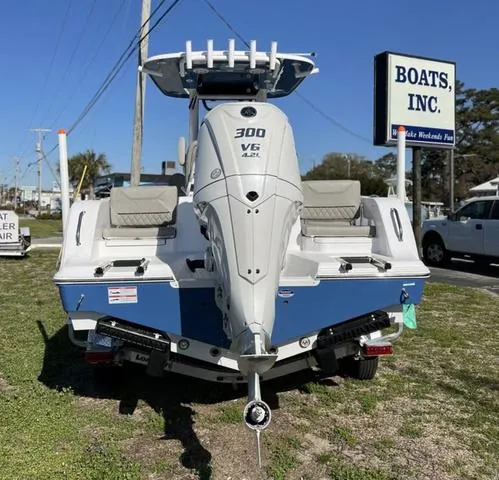 Slide: The Image of 2025 Sportsman Heritage 231 boat with sleek cabin design and modern features. - 7