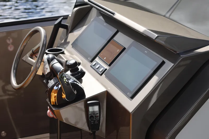 Slide: The Image of Dashboard of 2021 Vanquish Yachts VQ40 with modern controls and displays. - 17