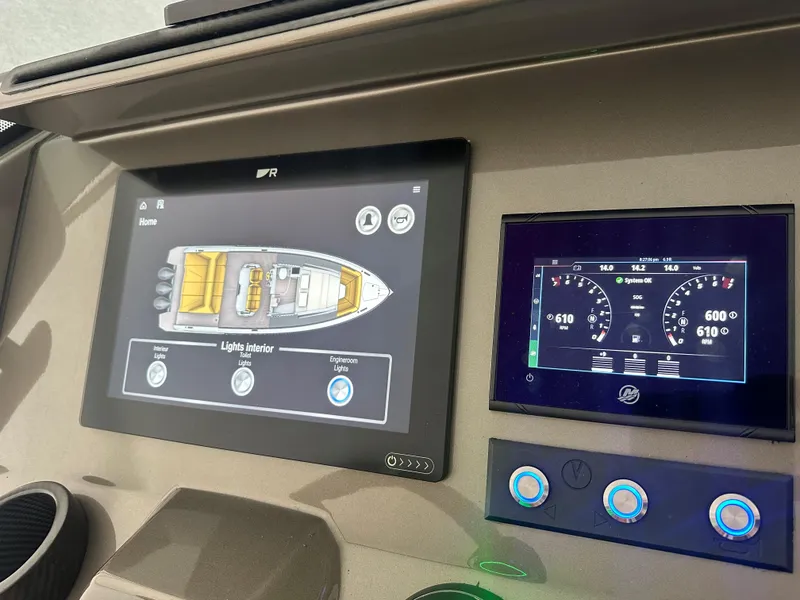 Slide: The Image of Dashboard of 2021 Vanquish Yachts VQ40 with navigation and control screens. - 19