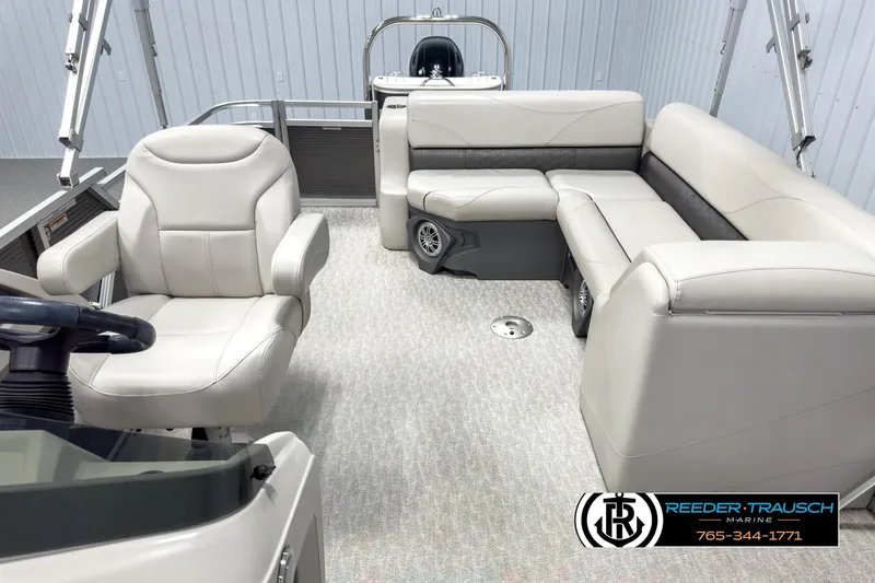 Slide: The Image of 2020 Avalon 2285 LSZ CRB boat interior with plush seating and modern design. - 14
