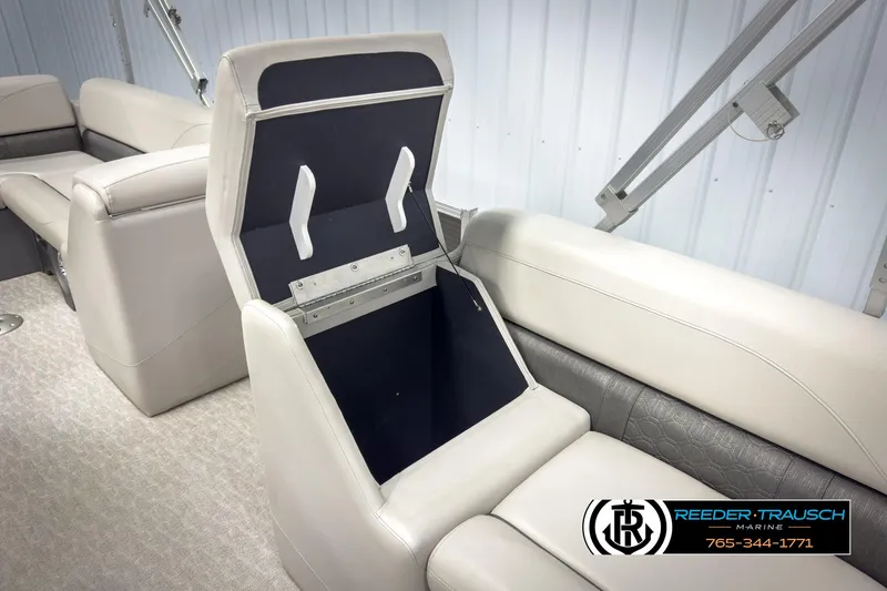 Slide: The Image of Avalon 2285 LSZ CRB 2020 boat interior with open storage compartment. - 22