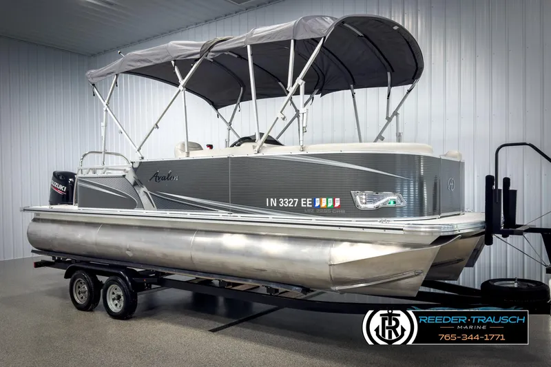 Slide: The Image of 2020 Avalon 2285 LSZ CRB pontoon boat on trailer in indoor showroom. - 3