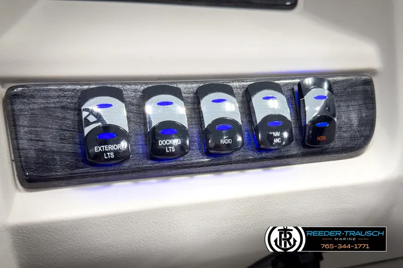 Slide: The Image of Control panel of 2020 Avalon 2285 LSZ CRB with illuminated switches. - 32