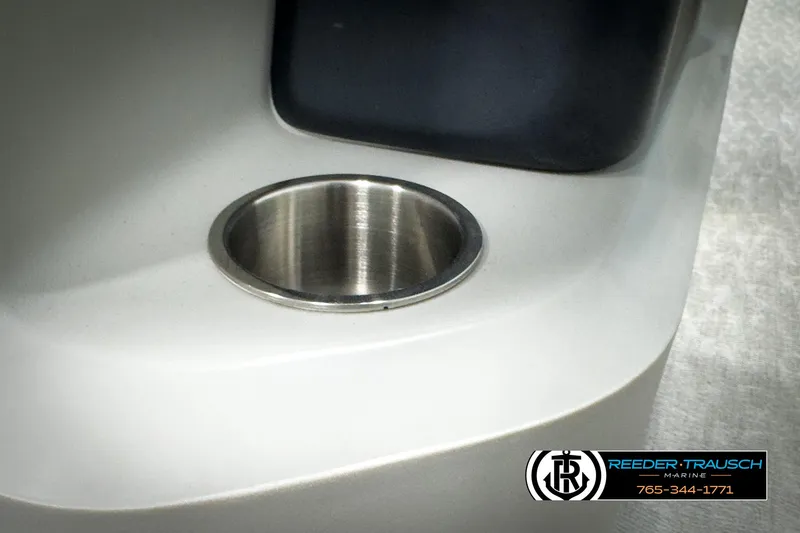 Slide: The Image of Avalon 2285 LSZ CRB 2020 boat cup holder detail with Reeder-Trausch Marine logo. - 36
