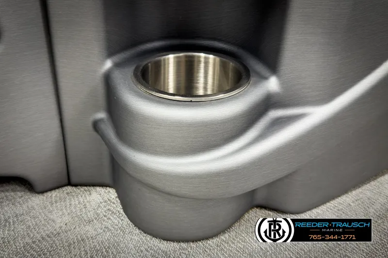 Slide: The Image of Avalon 2285 LSZ CRB 2020 cup holder detail, Reeder-Trausch Marine logo visible. - 38