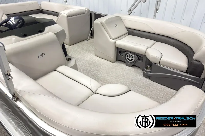 Slide: The Image of 2020 Avalon 2285 LSZ CRB pontoon boat interior with plush seating and modern design. - 9