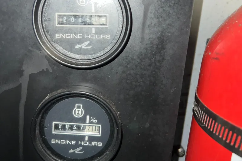 Slide: The Image of Close-up of engine hour meters on a 1992 Sea Ray 370 Express Cruiser. - 37