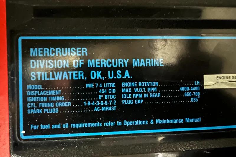 Slide: The Image of MerCruiser engine specifications label for 1992 Sea Ray 370 Express Cruiser, detailing model and technical data. - 38