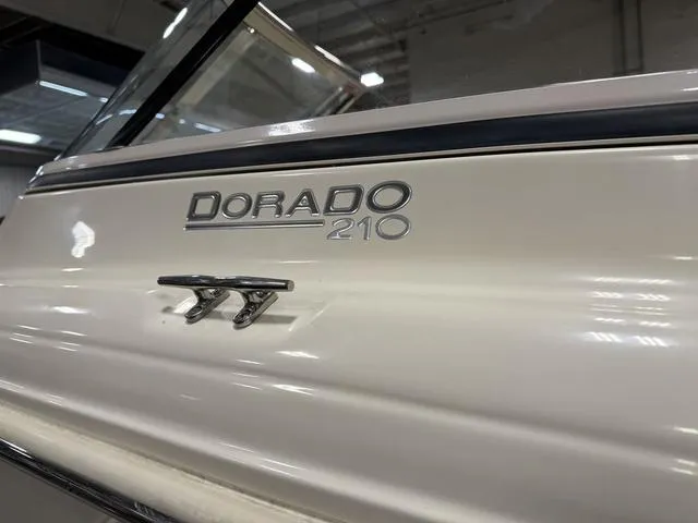 Slide: The Image of 2021 Scout 210 Dorado boat, close-up of model name and cleat. - 4