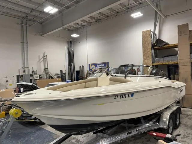 Slide: The Image of 2021 Scout 210 Dorado boat on trailer in indoor storage facility. - 5