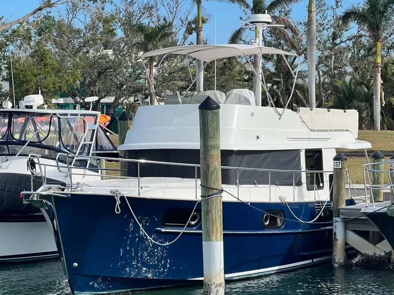The Image of 2019 Beneteau Swift Trawler 44 docked, featuring sleek design and modern amenities. - 0