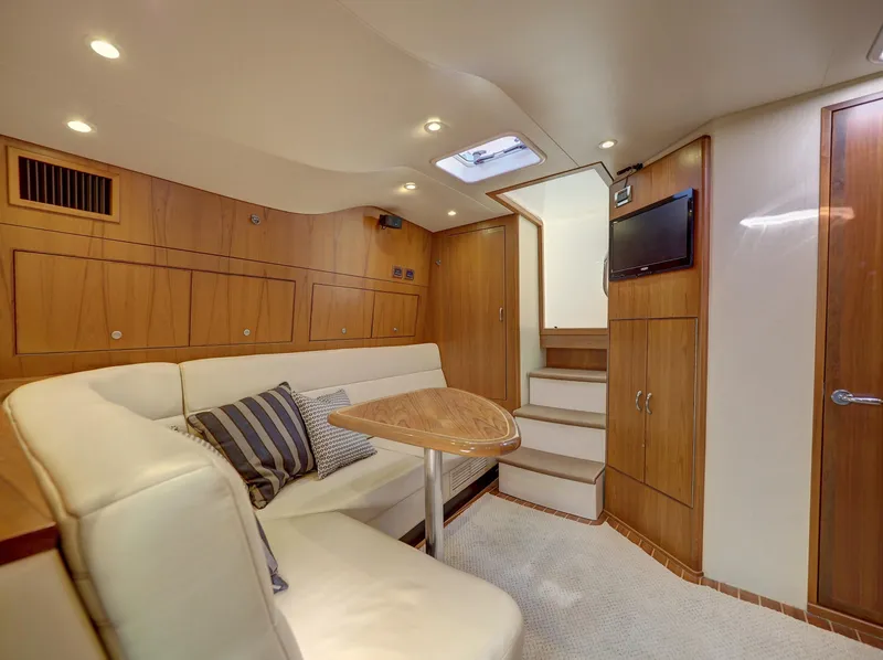 Slide: The Image of Luxurious interior of 2013 Cabo HTX yacht with cozy seating and modern amenities. - 11