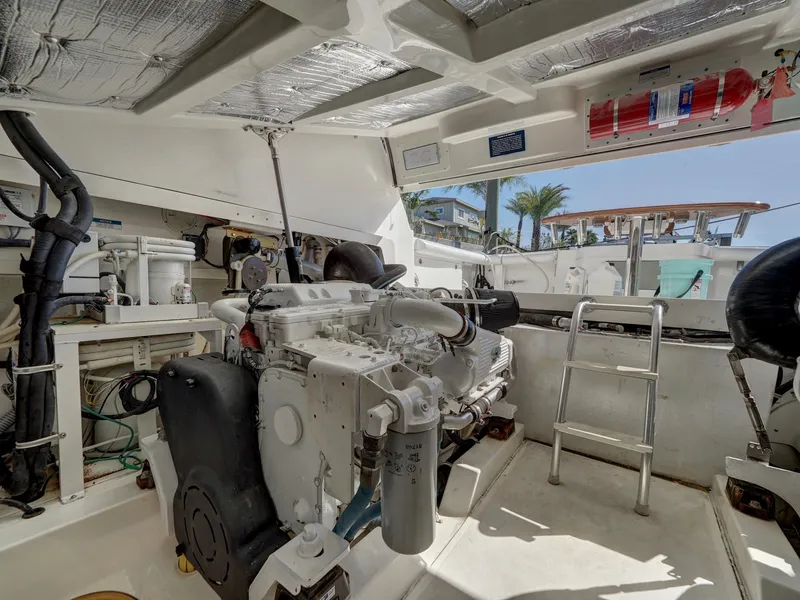 Slide: The Image of Engine room of 2013 Cabo HTX boat with visible machinery and equipment. - 24
