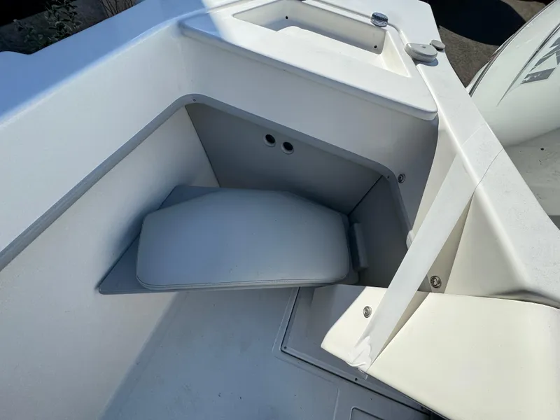 Slide: The Image of 2025 Arima Sea Chaser 19 Yellowtail Edition boat interior with storage compartment. - 11