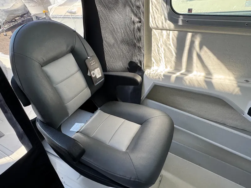 Slide: The Image of 2025 Arima Sea Chaser 19 Yellowtail Edition interior seat, featuring sleek black and gray design. - 5