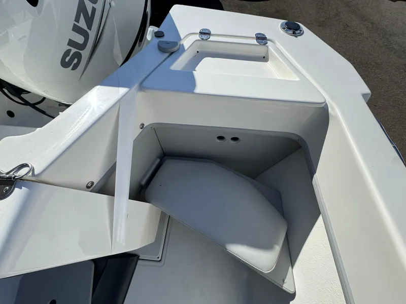 Slide: The Image of 2025 Arima Sea Chaser 19 Yellowtail Edition boat interior with Suzuki engine detail. - 9