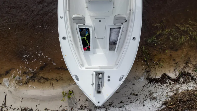 Slide: The Image of Aerial view of 2021 Sea Hunt Gamefish 25 boat on sandy shore. - 8