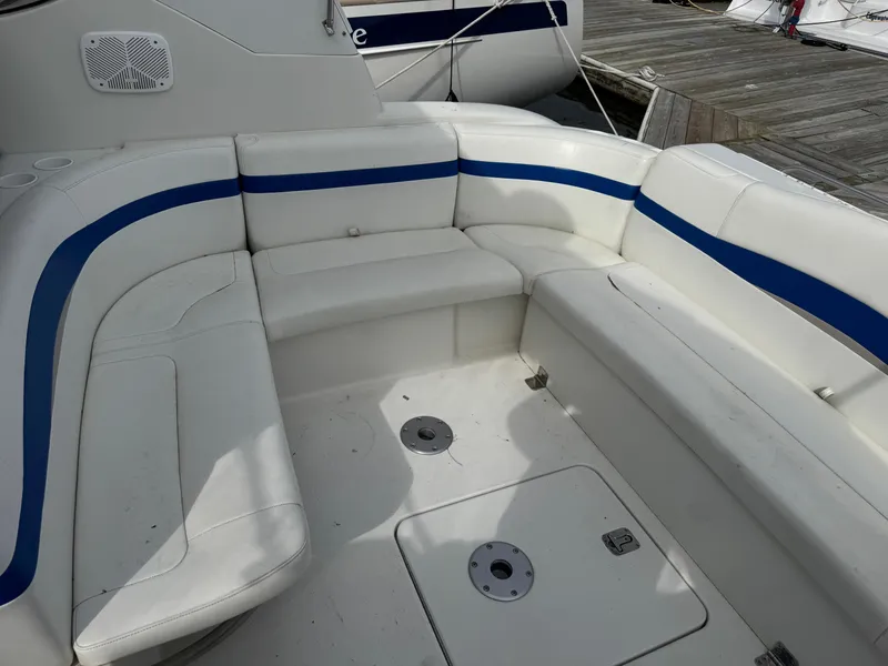 Slide: The Image of 2001 Formula 40 Performance Cruiser with white and blue seating on deck. - 6