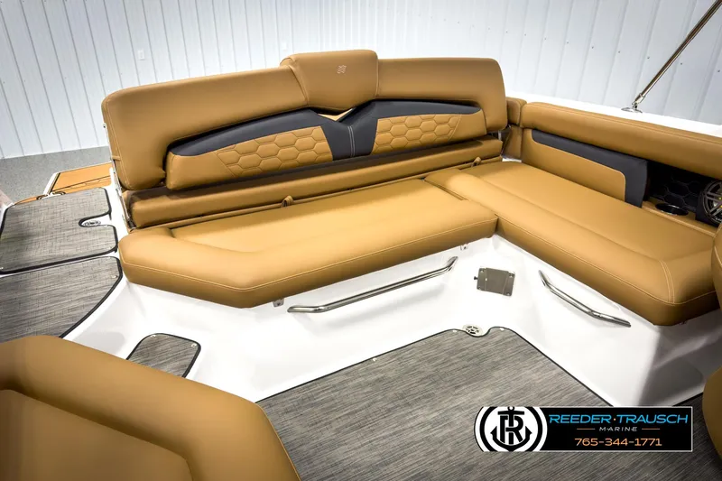 Slide: The Image of 2025 Four Winns HD3 boat interior with tan leather seating and modern design. - 27