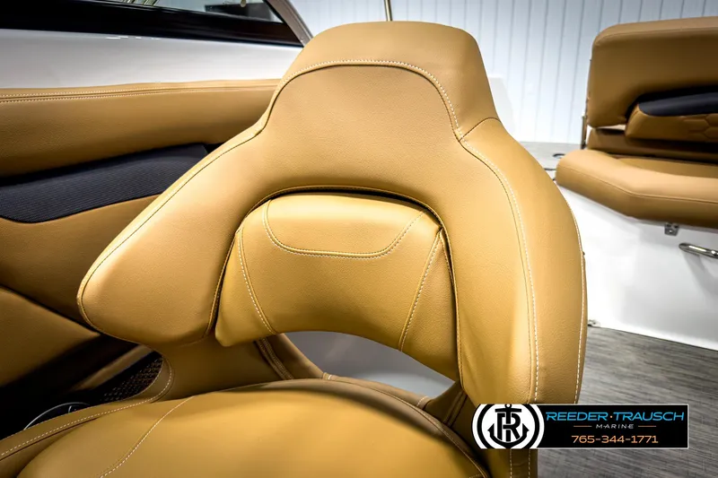 Slide: The Image of Luxurious tan leather seating in 2025 Four Winns HD3 boat interior. - 37