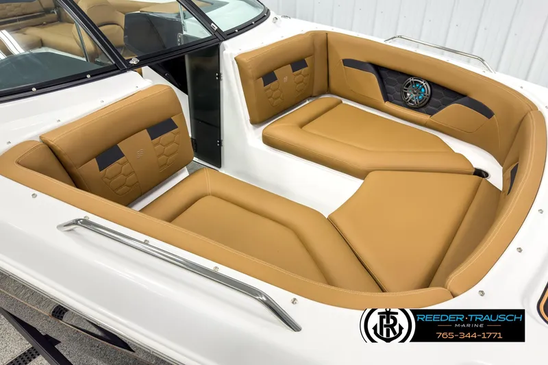 Slide: The Image of 2025 Four Winns HD3 boat interior with tan seating and modern design. - 9