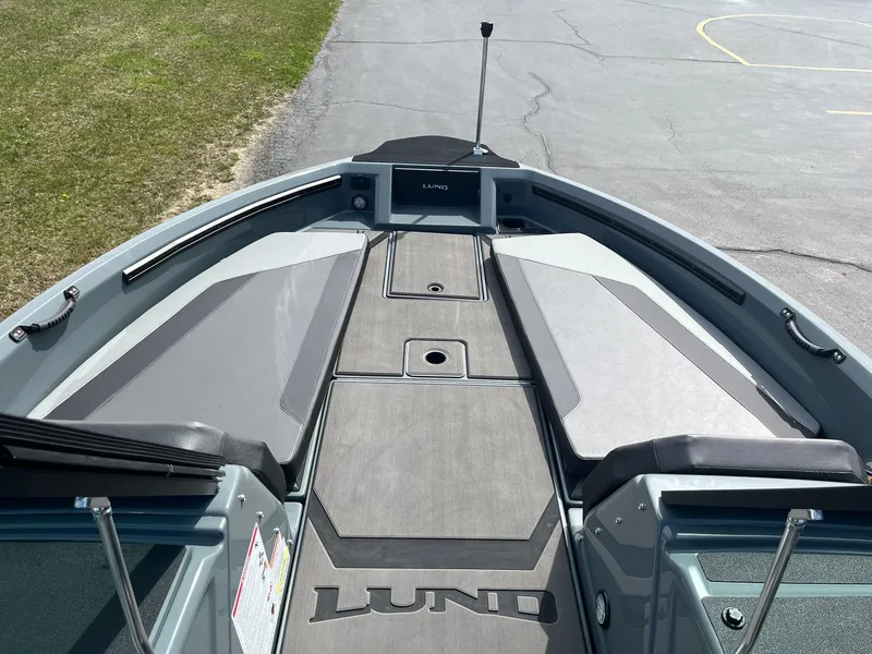 Slide: The Image of 2025 Lund 185 Impact GL boat deck with sleek design and spacious layout. - 15