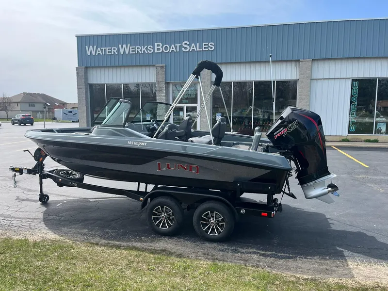 Slide: The Image of 2025 Lund 185 Impact GL boat on trailer at Water Werks Boat Sales. - 2