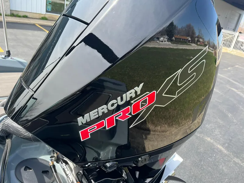 Slide: The Image of Mercury Pro XS engine on 2025 Lund 185 Impact GL boat, close-up view. - 38