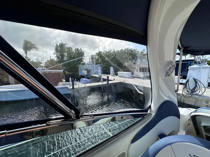 Slide: The Image of View from 2004 Sea Ray 360 Sundancer cabin, overlooking marina dock. - 10