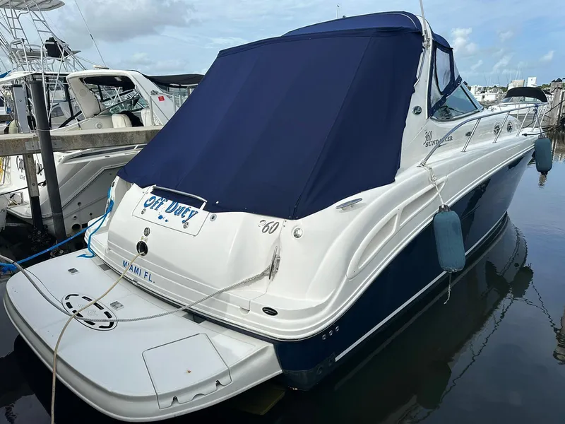 Slide: The Image of 2004 Sea Ray 360 Sundancer yacht docked in marina, blue cover, Miami, FL. - 3