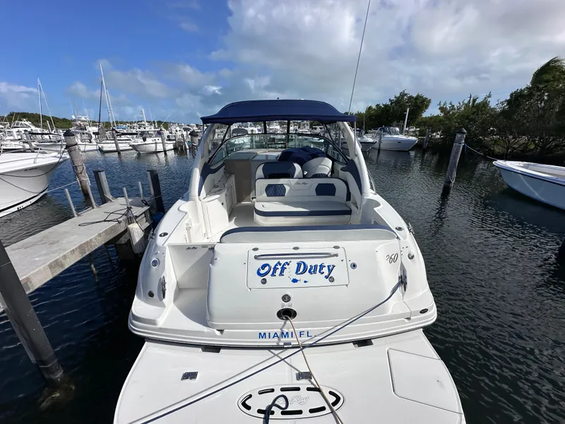 Slide: The Image of 2004 Sea Ray 360 Sundancer docked in a marina, named "Off Duty," Miami, FL. - 5