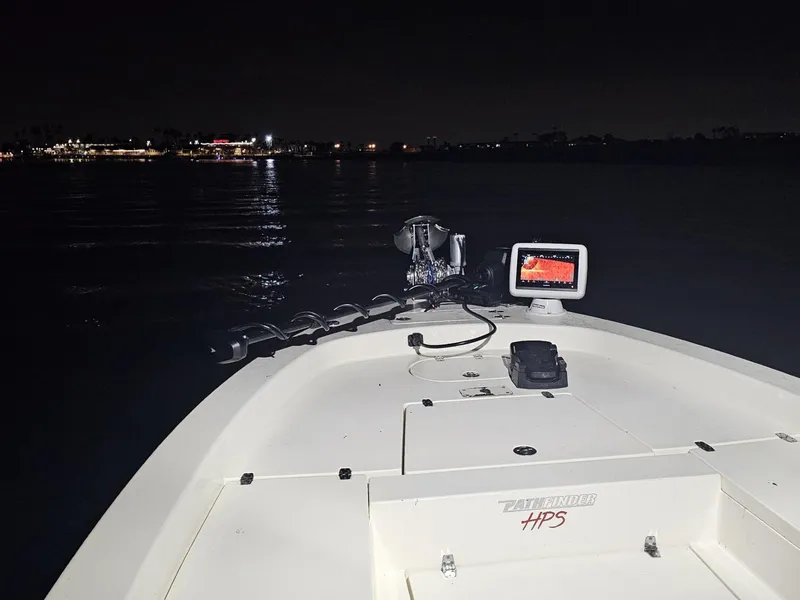 Slide: The Image of 2014 Pathfinder 2600 HPS boat at night with navigation equipment. - 6