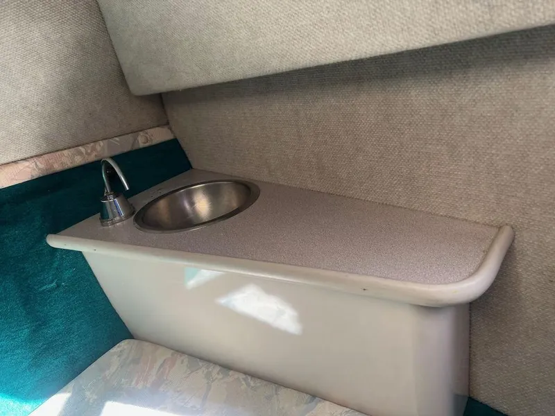 Slide: The Image of 1995 Regal Valanti 222 boat interior with sink and countertop. - 24