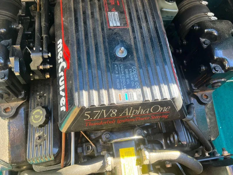 Slide: The Image of 1995 Regal Valanti 222 engine, MerCruiser 5.7L V8 Alpha One, close-up view. - 48