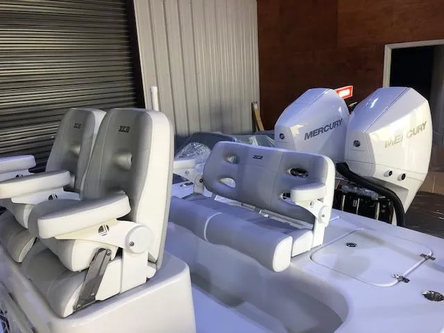 Slide: The Image of ZCB 2600 Freemason CC 2021 boat with Mercury engines and comfortable seating. - 5