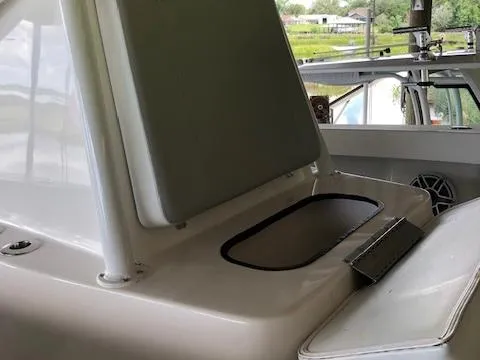 Slide: The Image of ZCB 2600 Freemason CC 2021 boat interior with seating and storage compartment. - 8